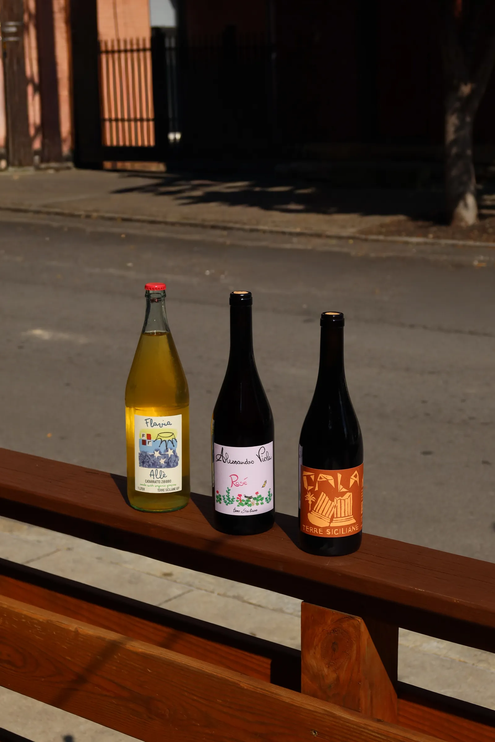 Three natural wines catching the afternoon sun